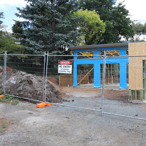 do you deliver and set up temporary fencing and what's the price for these services in Burwell